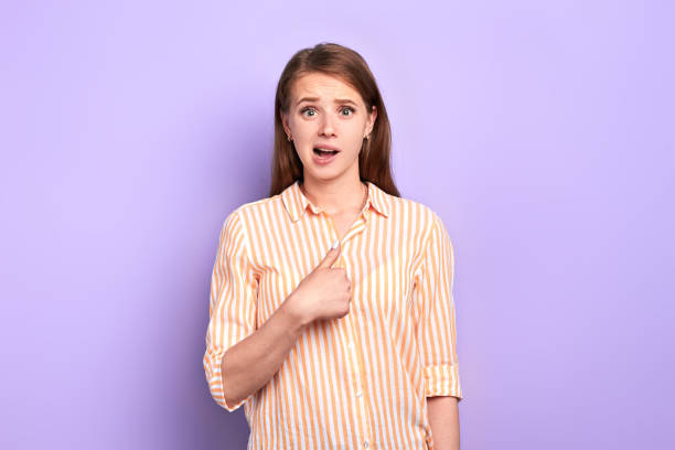 istock Front view of shocked young woman with questioning facial expression 1226337903