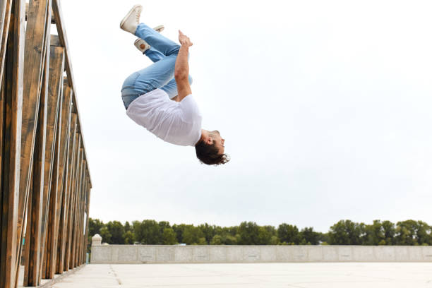 istock young sportsman performing back flip 1226339549