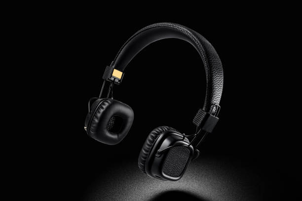 istock Wireless on-ear headphones on black background 1226339583
