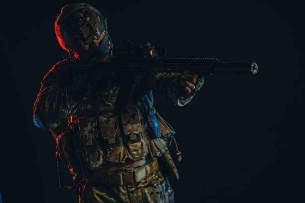 istock brave soldier shooting weapon in UV space 1226340460