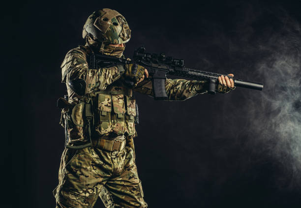 istock soldier man shooting through fogger smoke 1226341230