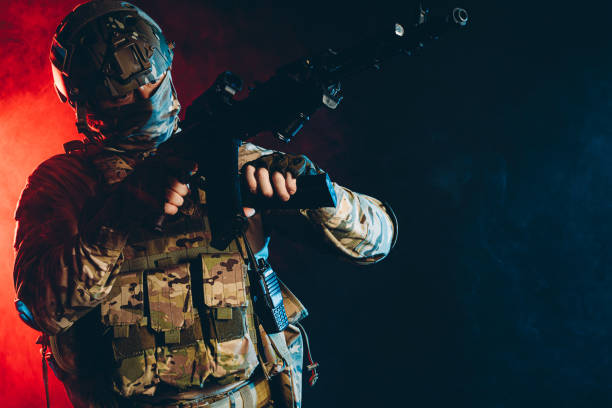 istock warrior man in military uniform in smoky background with UV rays 1226341322