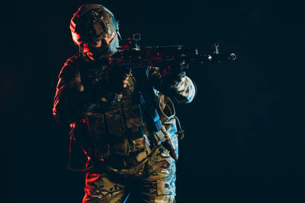 istock brave soldier shooting weapon in UV space 1226342174