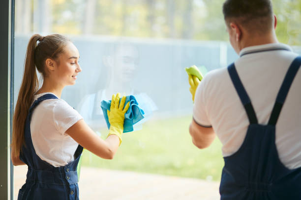 istock two caucasian cleaners doing clean-up with pleasure 1226343634