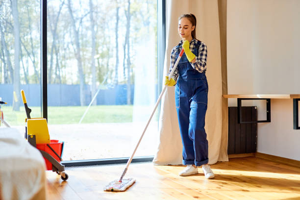 istock Young janitor in uniform for cleaning mopping floor 1226344817