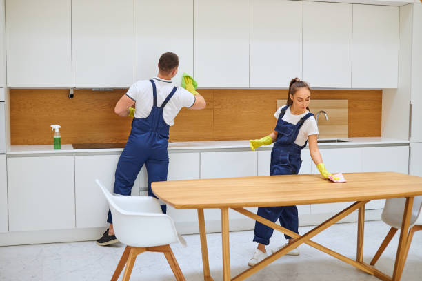 istock Team work of young cleaners in kitchen 1226345001