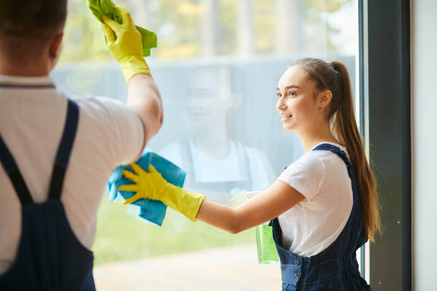 istock two caucasian cleaners doing clean-up with pleasure 1226345097