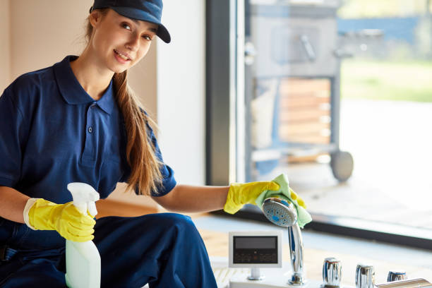 istock Confident female janitor washing bath 1226345212