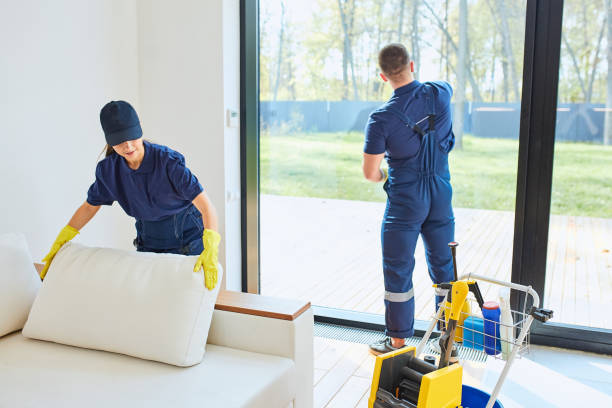 Cleaning service team working in new house