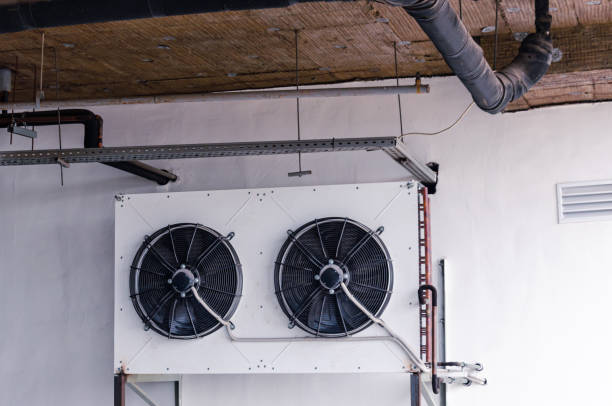 External air conditioning unit, heat exchanger on the ground floor External air conditioning unit, heat exchanger on the ground floor of the building Air Exchanger stock pictures, royalty-free photos & images