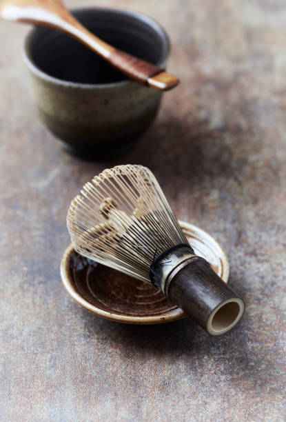 istock Bamboo tea whisk on rustic stone background. Close up. 1226354394