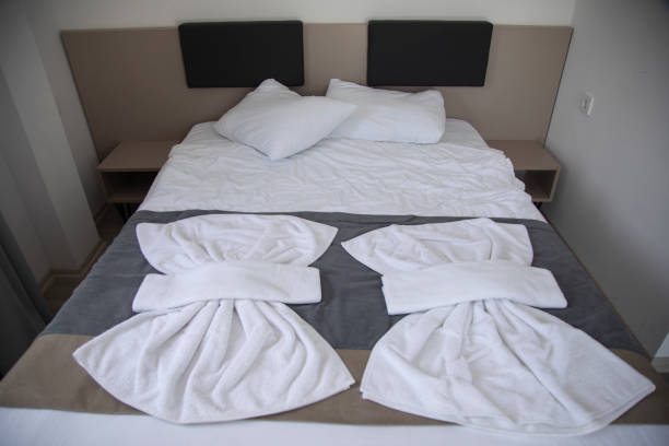 istock white towels, pillows and a comfortable bed 1226354464