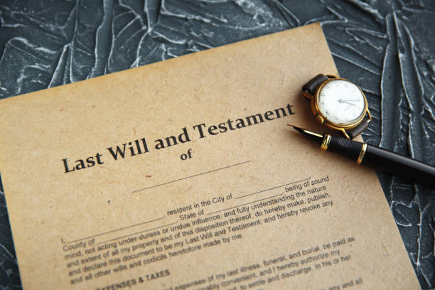 istock Notary's public pen and stamp on testament and last will. Notary public 1226355475