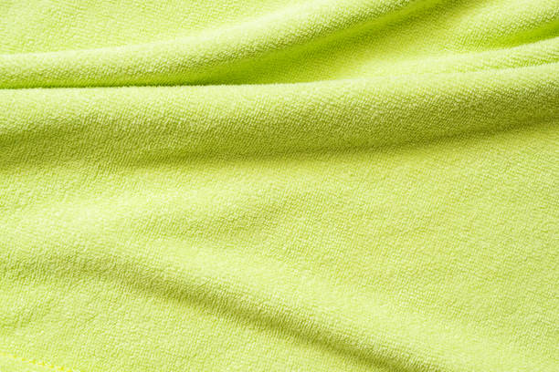 istock Green towel fabric texture surface close up background 1226355683