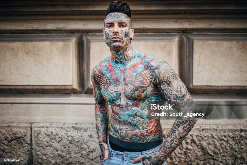 Man With Whole Body Covered In Tattoos Standing By Building Wall In The  City Stock Photo - Download Image Now - iStock