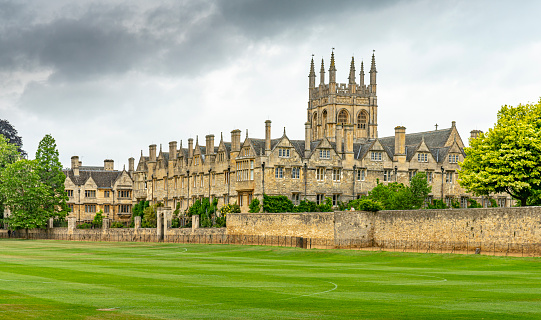 Christ Church Cathedral Oxford. These gardens are in the grounds of Christ Church College, Oxford, England, UK. The prominent building is the Christ Church College chapel or Cathedral.