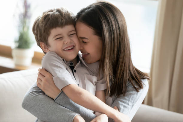 istock Happy young mom hug small preschooler son 1226364336