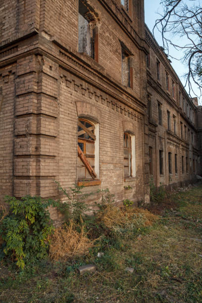 istock Facade of old abandoned brick building 1226368636