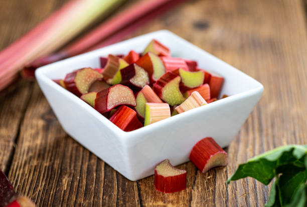 istock Chopped Rhubarb on an old wooden table (close up shot) 1226368793