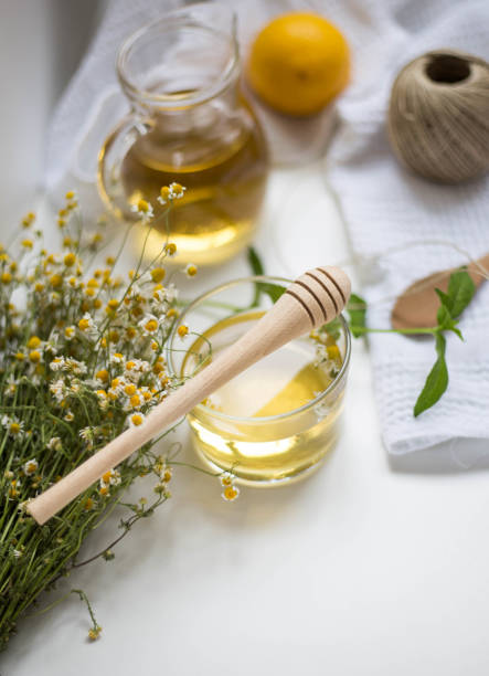 istock Cup of herbal tea with chamomile flowers 1226372746