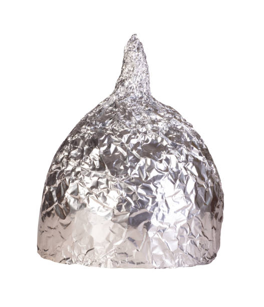 Tin foil hat Tin foil hat isolated on white background tin foil hat stock pictures, royalty-free photos & images
