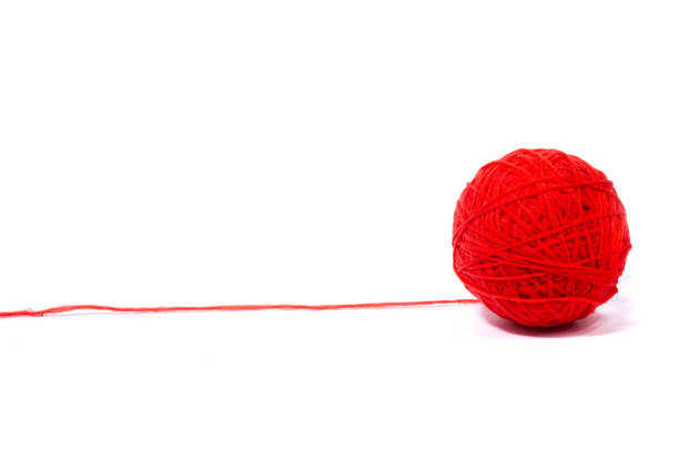 istock red ball of woolen thread,  Isolated on a white background. 1226377459