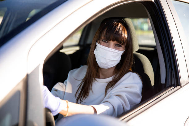 istock Woman driving to work during pandemic days 1226379507