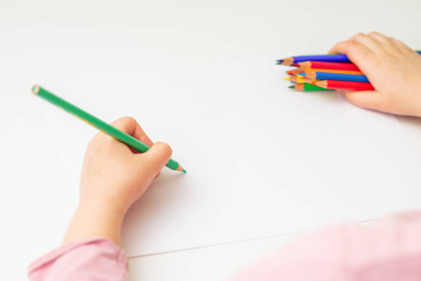istock Child is drawing by colored pencils. 1226381581