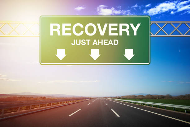 istock Recovery and Coronavirus. Recovery road sign. 1226382128