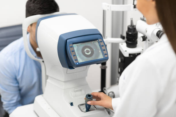 istock Optometrist checking patients vision at modern clinic 1226383128
