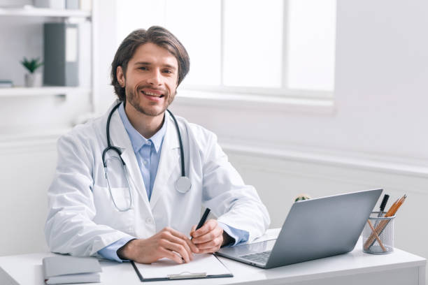 istock Medical doctor sitting at workplace in office 1226383220