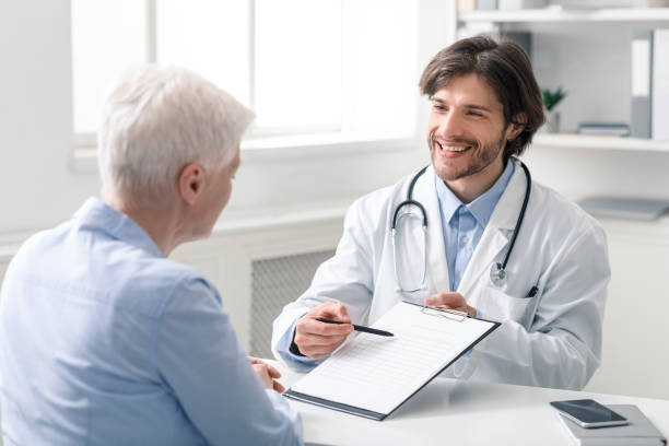 istock Friendly geriatrician explaining prescription for senior patient 1226384218