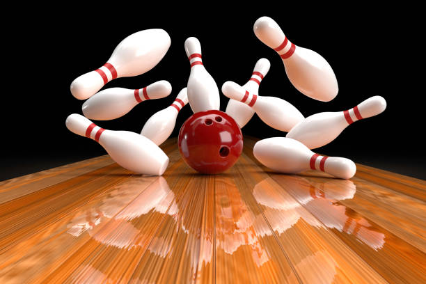 Bowling strike concept: red ball with pins 3D graphics of bowling ball and fallen skittles on the playing field bowling strike stock pictures, royalty-free photos & images