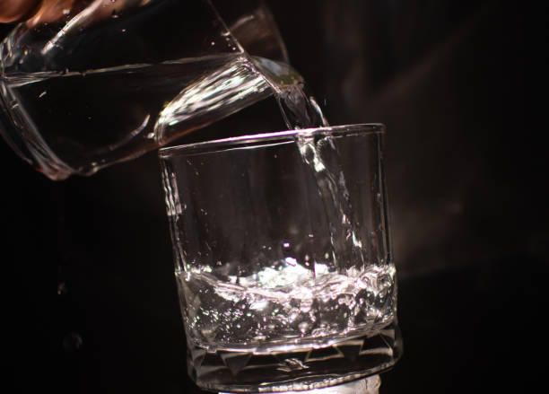 background photo a glass of water with light and shadow abstract beautiful vivid fresh thirsty clean healty refresh - healty imagens e fotografias de stock
