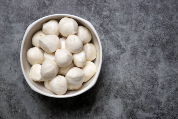 istock Boiled fish balls in white bowl on black marble table with copy space; top view 1226388486