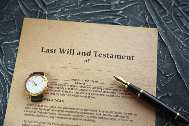 istock Notary's public pen and stamp on testament and last will. Notary public 1226388610