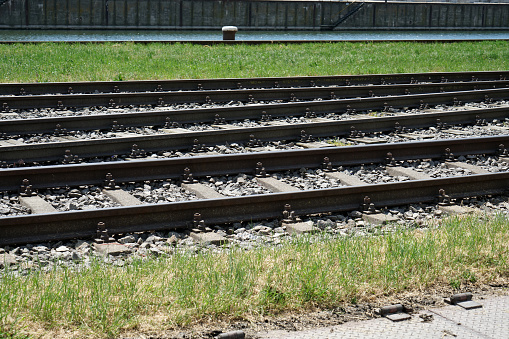This is a hardened steel railroad tracks photographed on a sunny spring day