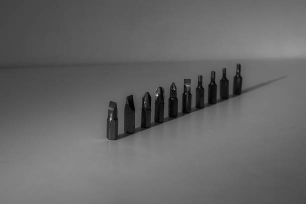 istock Different types of screw bits of screwdriver isolated on white background. 1226390483