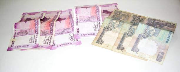 istock Indian paper currency notes or money on isolate white background. new Indian rupees 1226392217