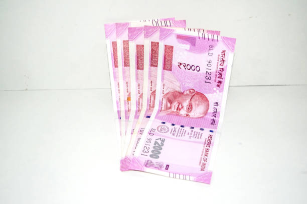 istock Indian paper currency notes or money on isolate white background. new Indian rupees 1226392851