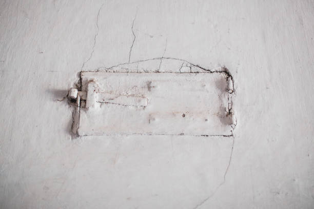 istock Old iron door in the wall for ash and ventilation 1226396273