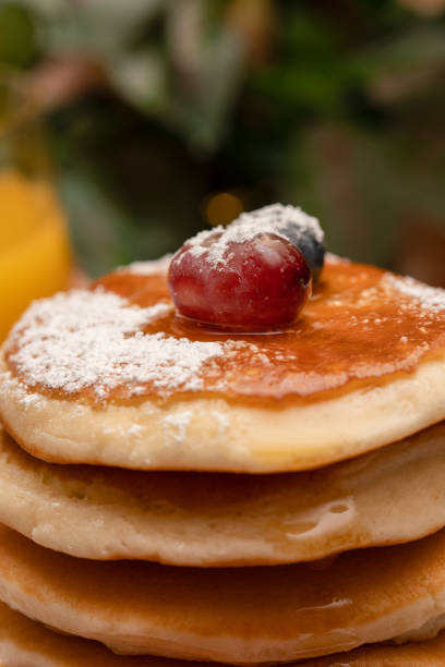 istock Fresh pancakes with fruit and maple syrup 1226402137