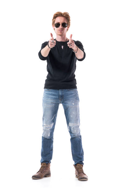 istock Serious young stylish man pointing finger at camera blaming and accusing you. 1226403048