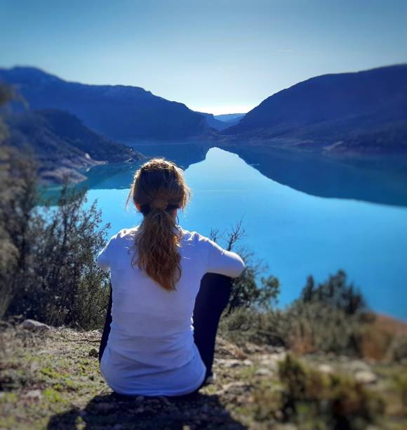 istock Girl looking at the horizon in calm 1226404192
