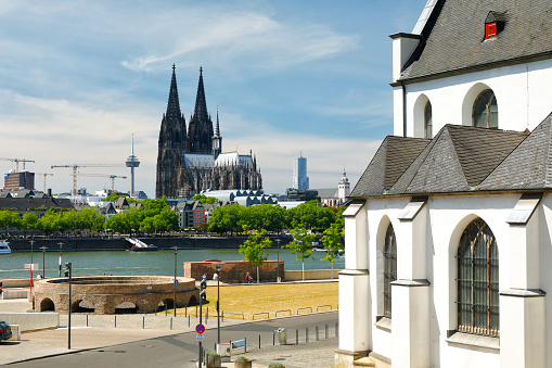 Majestic Cologne Cathedral – view from Deutz. Alt St. Heribert Church on the right side.