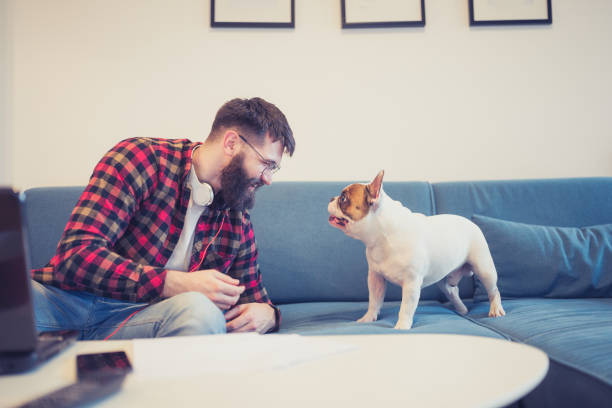 istock Young man and his dog 1226405569