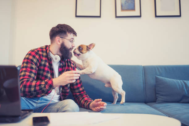 istock Young man and his dog 1226405629