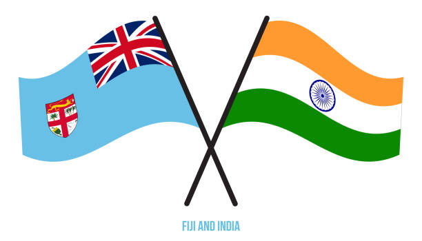 istock Fiji and India Flags Crossed And Waving Flat Style. Official Proportion. Correct Colors 1226408741