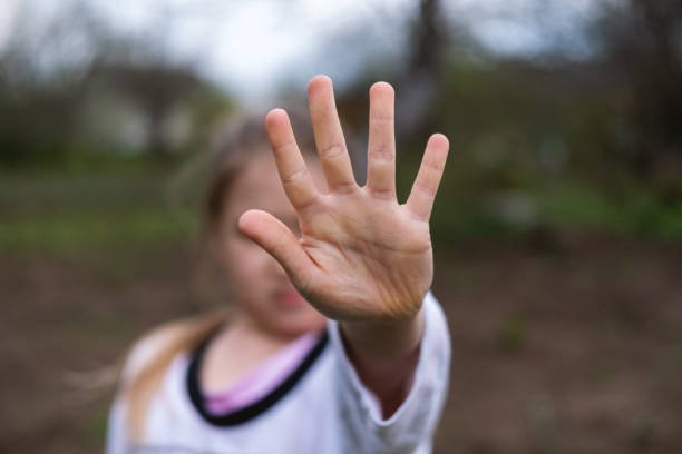 istock Girl making stop gesture with hand 1226408837