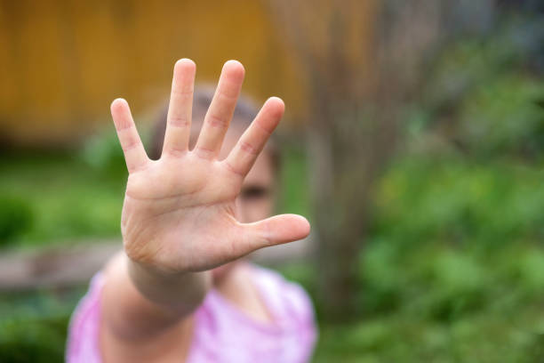istock Girl making stop gesture with hand 1226408843